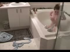A covert livecam video of my girlfriend masturbating in the bathtub